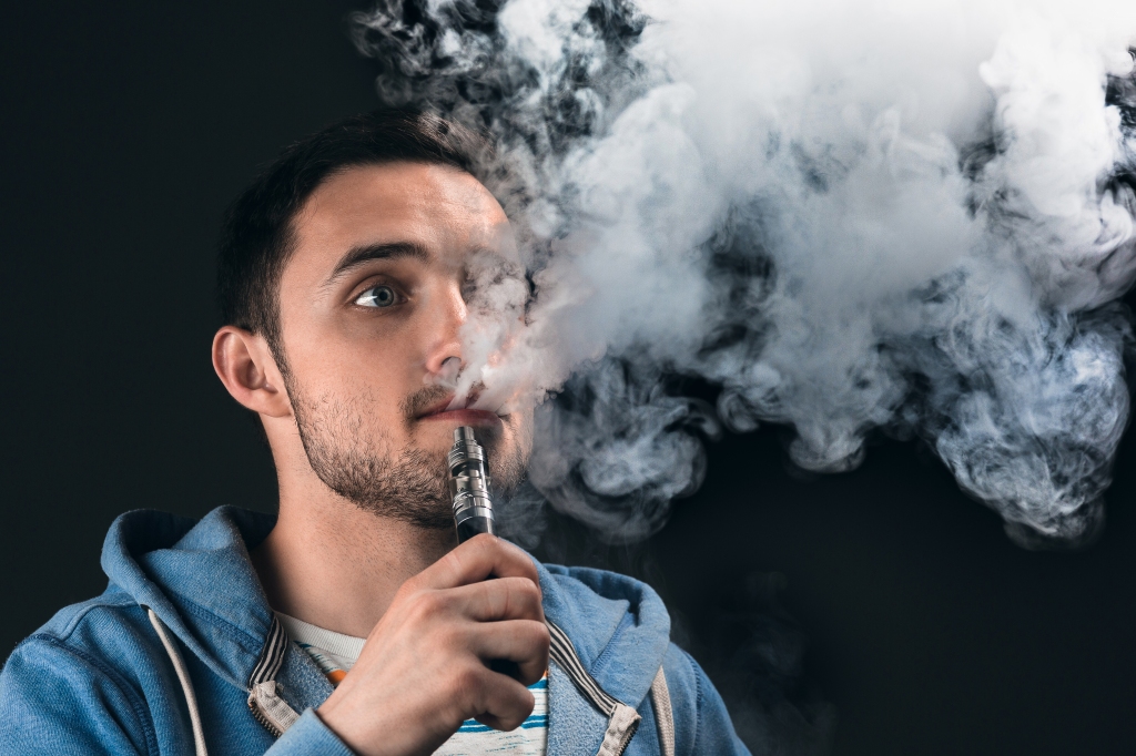 Oral Health Spotlight: Is Vaping Less Harmful Than Cigarettes?